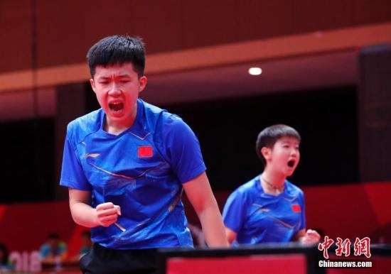 資料圖：雅加達(dá)亞運(yùn)會(huì)，王楚欽/孫穎莎奪得混雙冠軍。 <a target='_blank' href='/'>中新社</a>記者 劉關(guān)關(guān) 攝