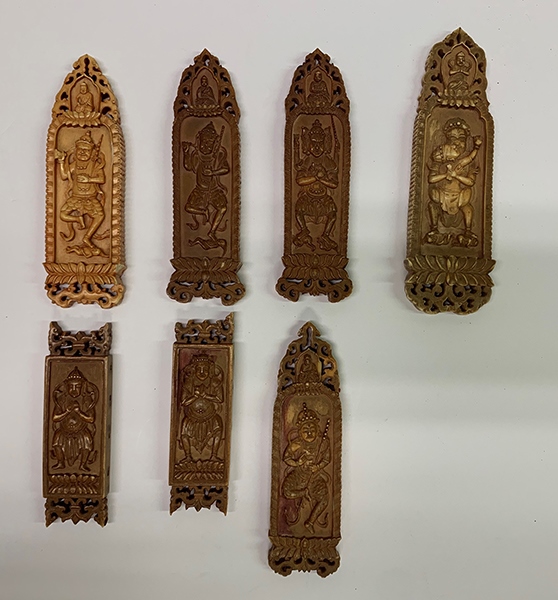 木雕牌飾（暫定名）。國(guó)家文物局供圖